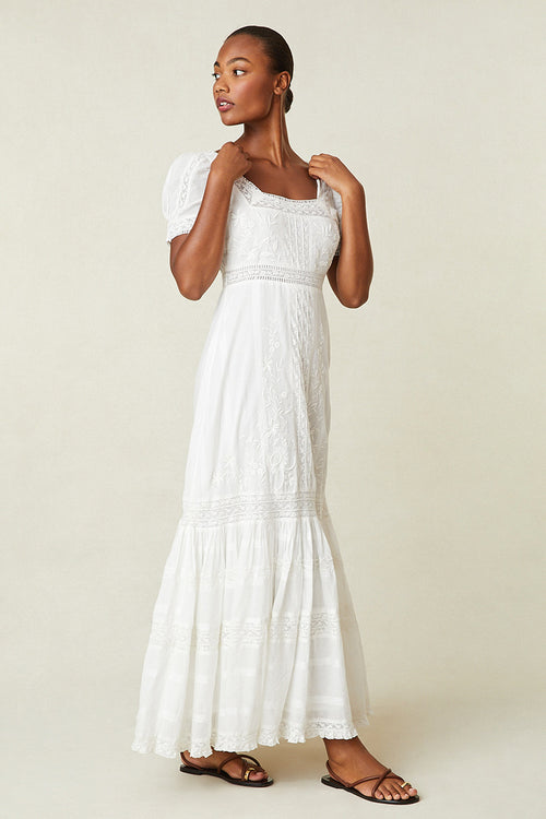 Model wearing white square neck maxi dress