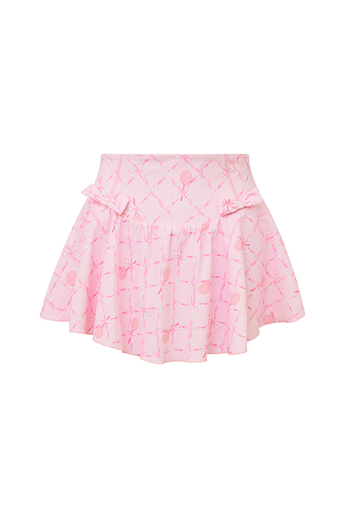 Pink active skort with a bow and tennis raquet pattern. Two pink bows placed on each frontside of hip.