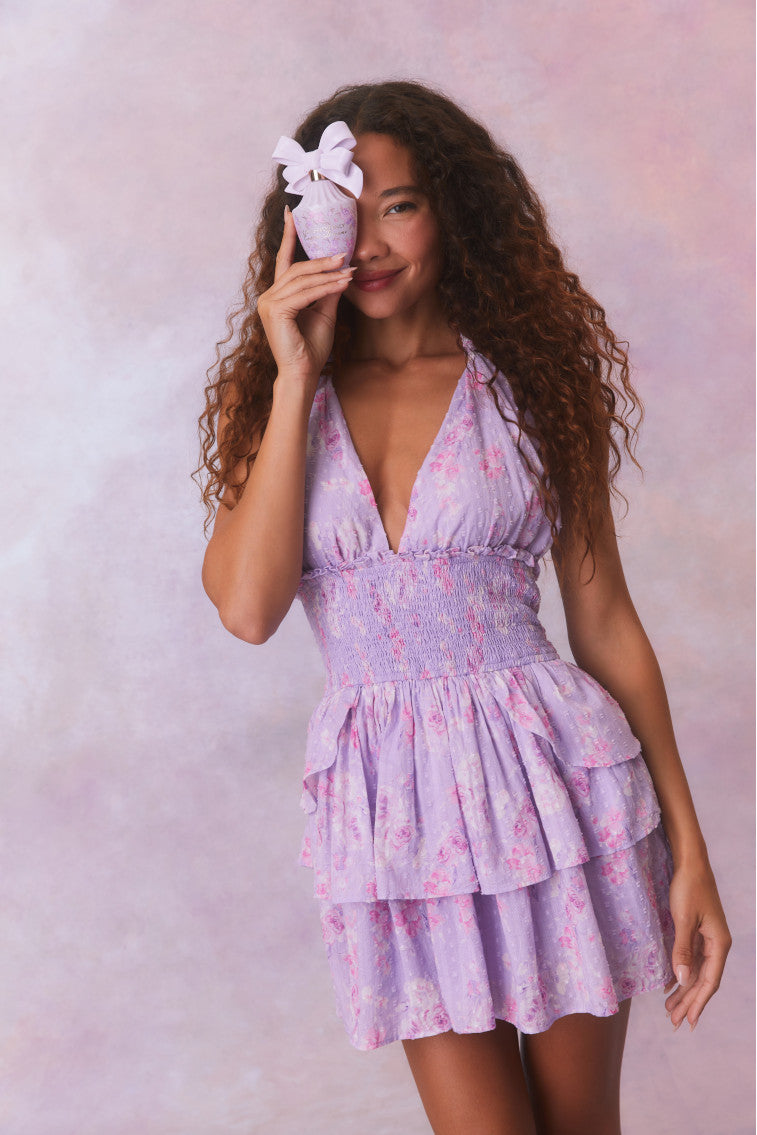 Purple floral low-cut halter dress with a smocked waistband and two ruffled tiers.