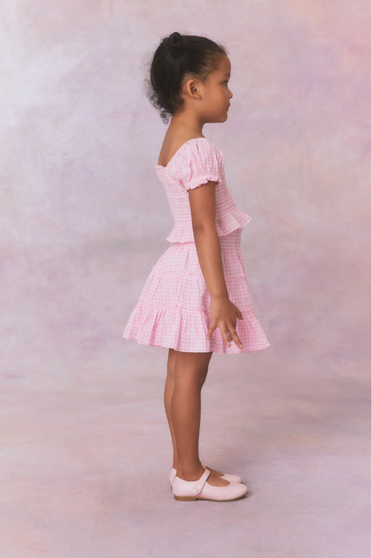 Pink gingham three tiered ruffle skirt, with elastic waistband for girls.