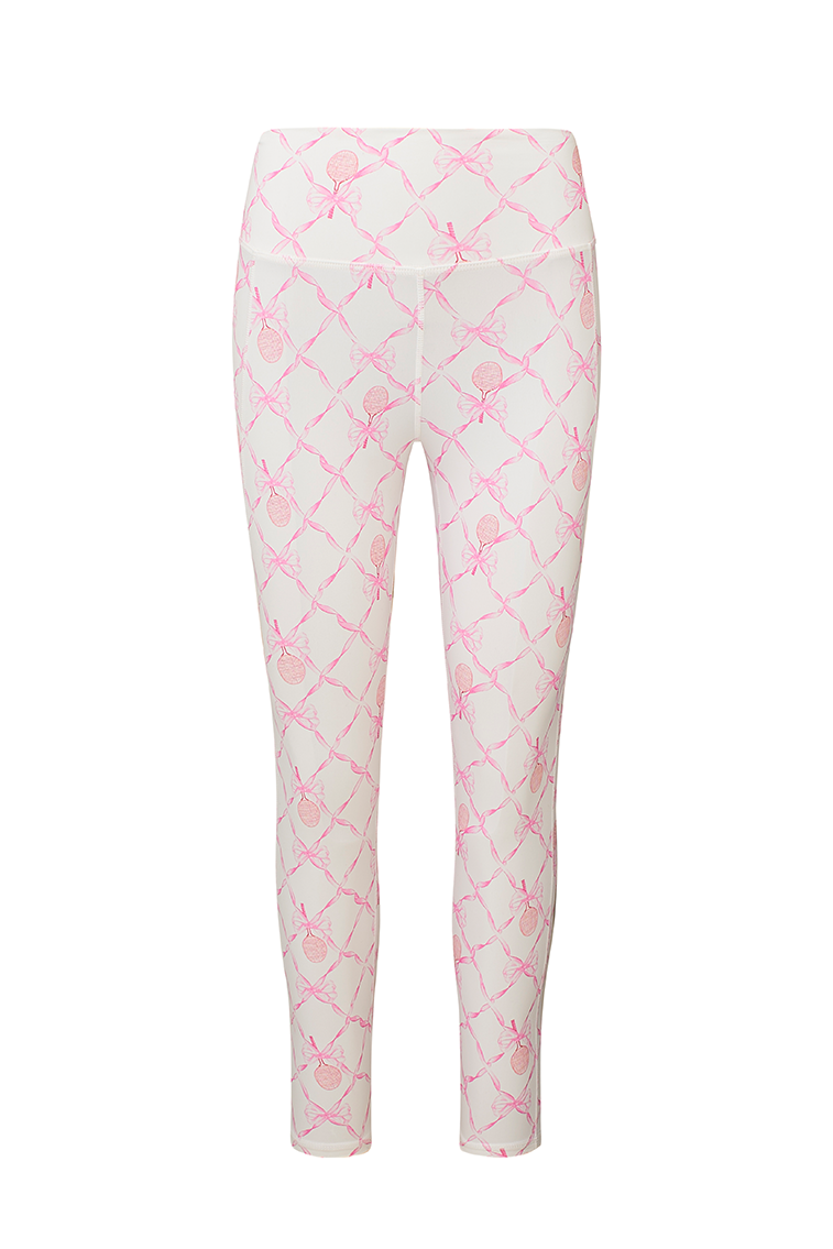White active legging with a pink colored bow and tennis raquet pattern. 