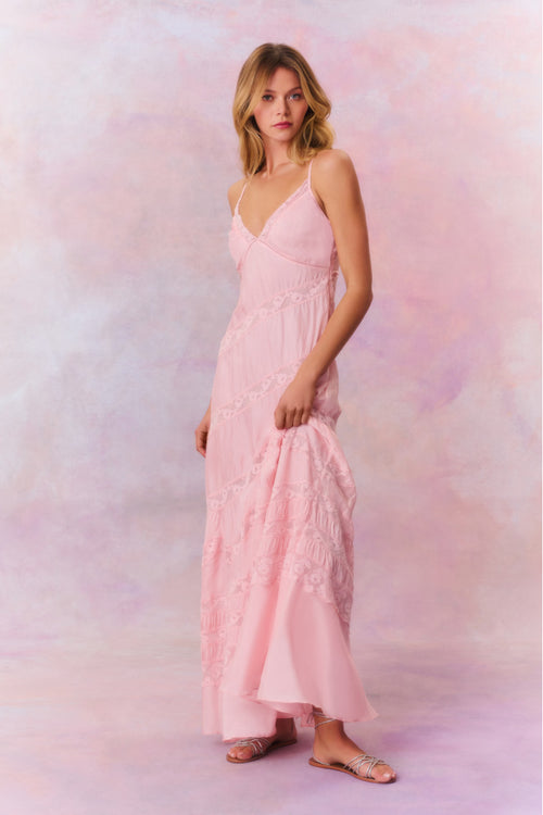 Maxi dress featuring a custom lace throughout and a beautiful V-neck line.