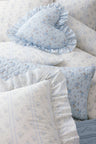 Blue ruffle throw pillow