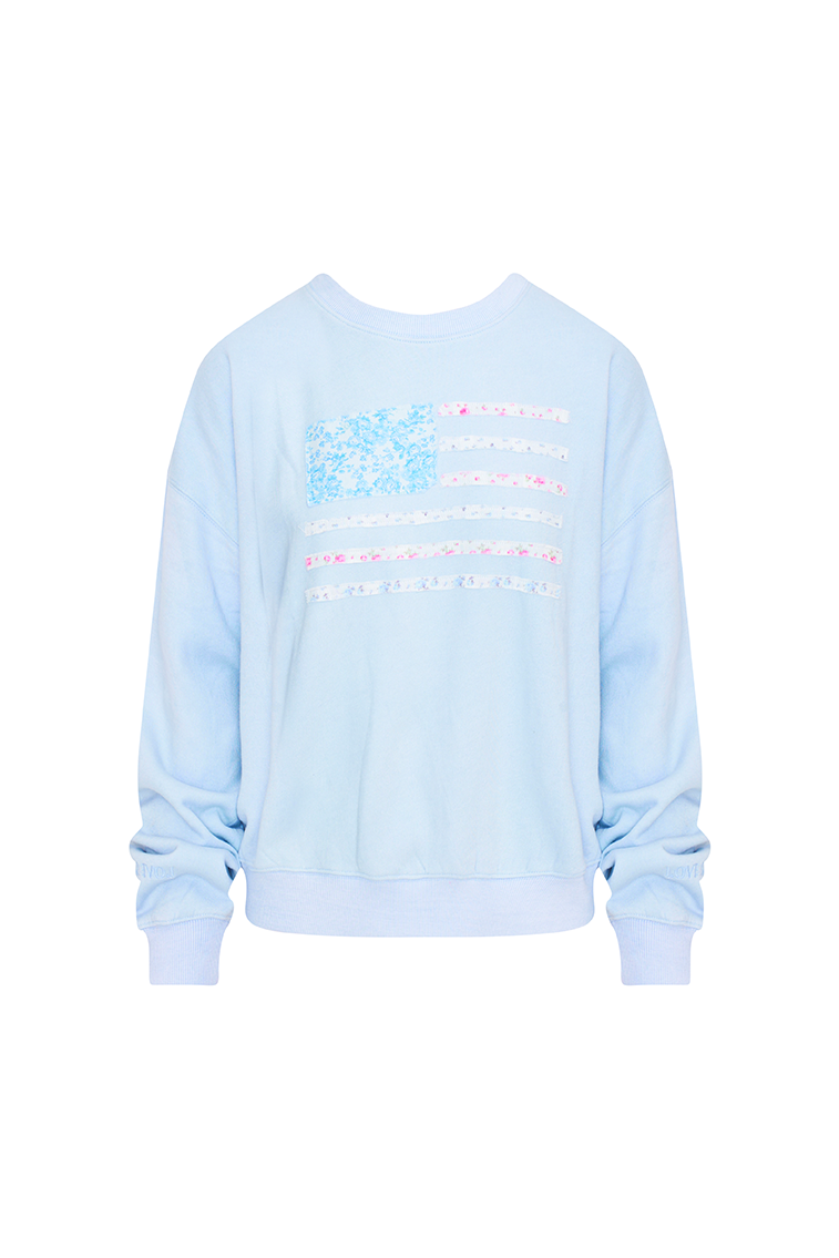 Light blue fleece pullover with a custom, floral printed American flag applique embroidered on the front.