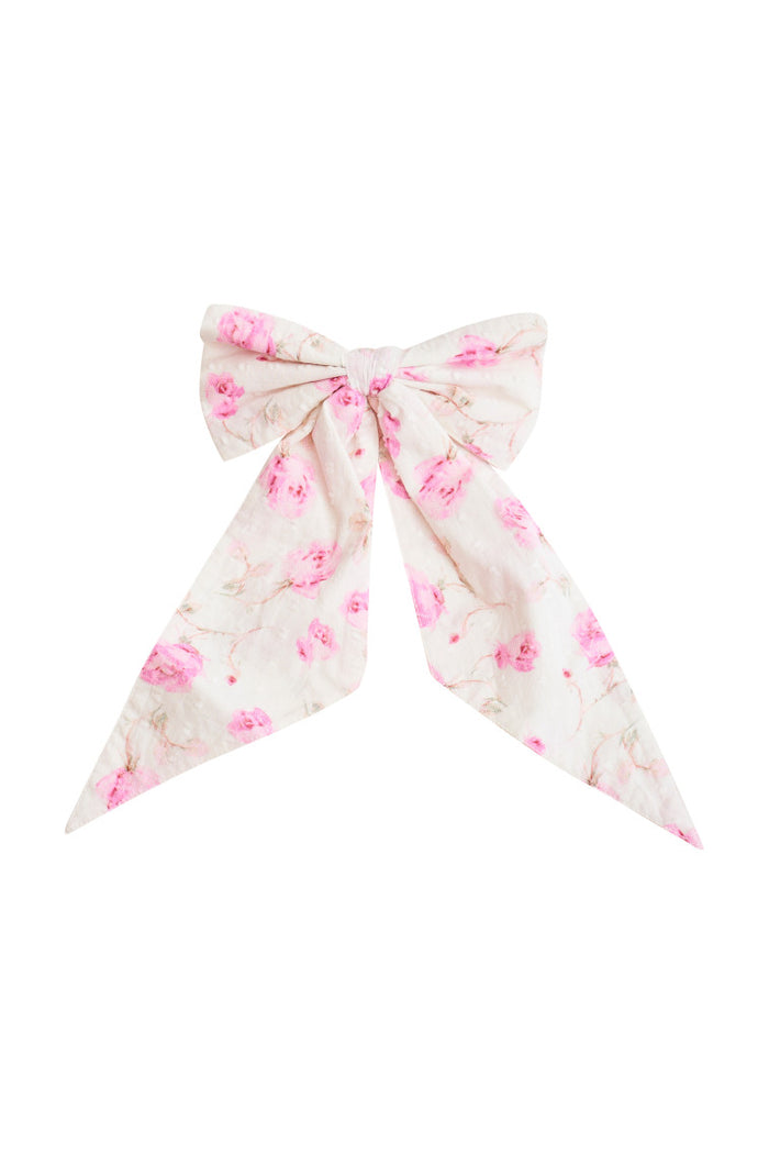 White floral bow clip-in.