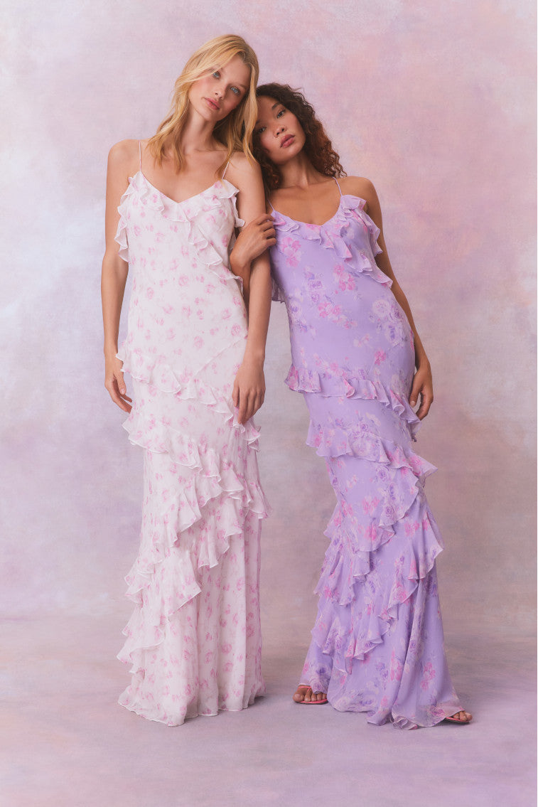 White and Purple floral chiffon maxi dress with spaghetti straps and ruffles that descend into the maxi skirt.