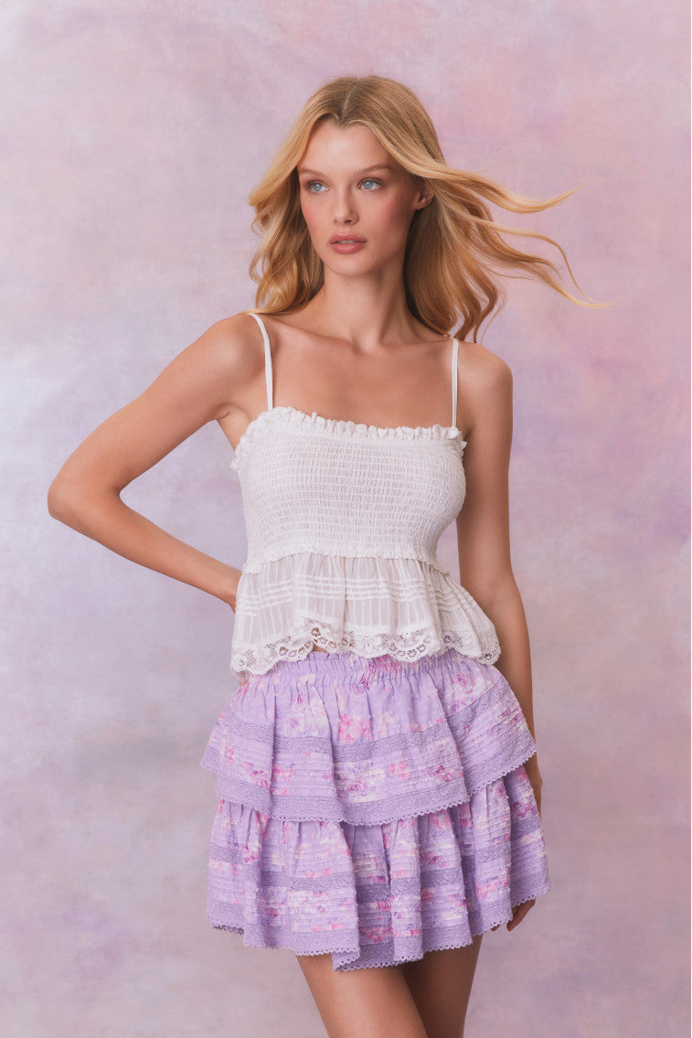 Purple floral ruffle mini skirt with lace on the two tiers. 